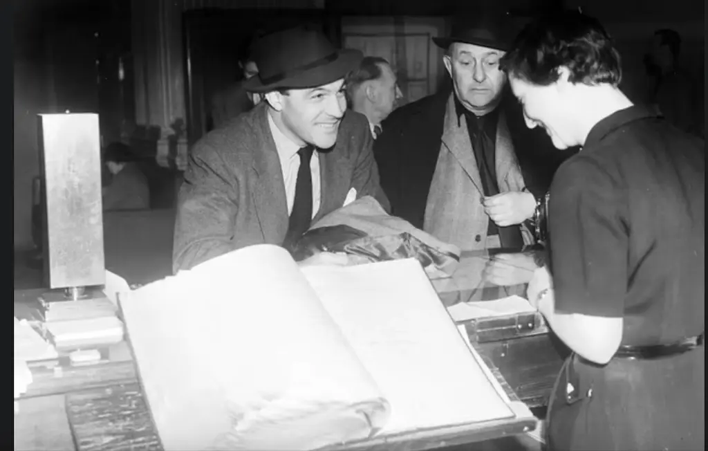 Gene Kelly Checking In to the Caledonian in Edinburgh